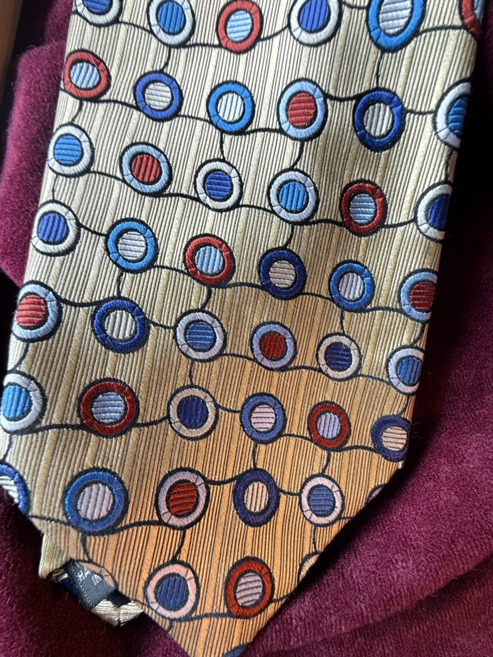 Silk Patterned Tie in Gold with Blue and Red Circles